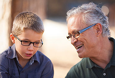 Grandfather and Grandson with Glasses