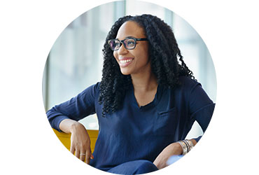 Smiling Woman in Chair